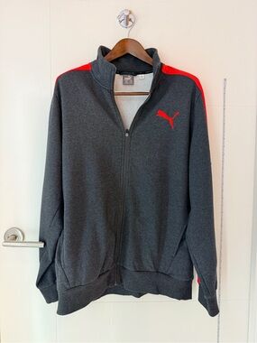 NWOT Puma Men's Dark Gray Zip-Up Jacket with Red Shoulder Accents